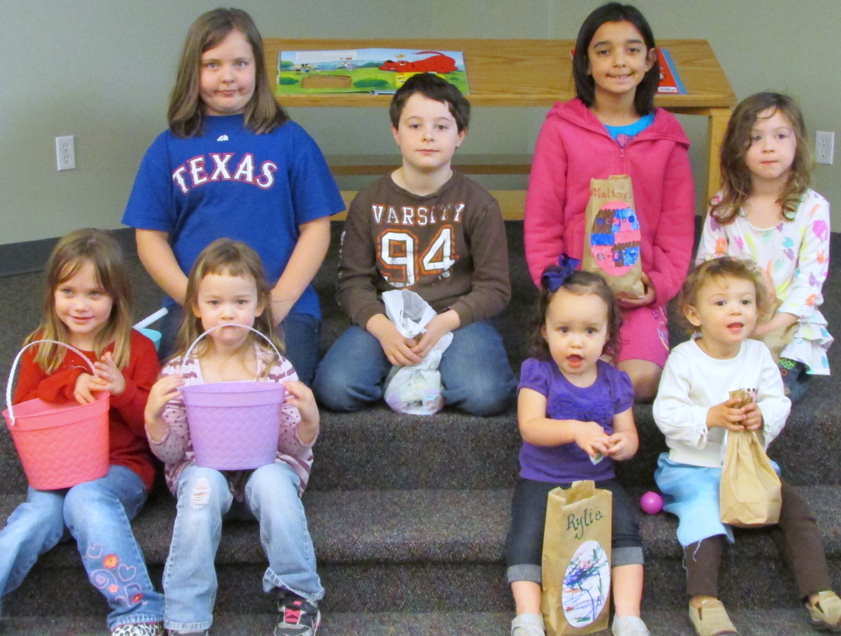 Posing for the shutterbug after the Storytime Easter Egg Hunt.